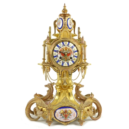 883 - A 19th Century French Mantel Clock, of mythical design, decorated with colourful porcelain panel and... 