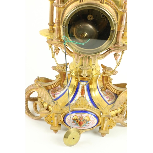 883 - A 19th Century French Mantel Clock, of mythical design, decorated with colourful porcelain panel and... 