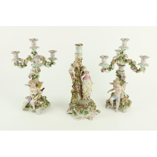 884 - An attractive pair of Sitzendorf porcelain Candelabra, each with three flower encrusted arms and a c... 