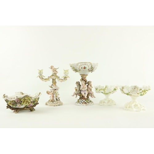 885 - A Sitzendorf porcelain Centerpiece, the pierced flower encrusted basket with floral panels on a flow... 