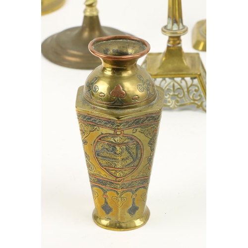 895 - A middle Eastern brass and inlaid Coffee Pot, with Islamic inscriptions, 8