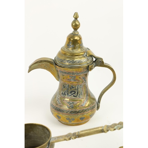 895 - A middle Eastern brass and inlaid Coffee Pot, with Islamic inscriptions, 8