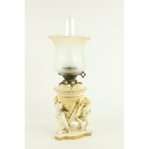 903 - An attractive 19th Century Moore Brothers porcelain Oil Lamp, in white and cream, the body and remov... 