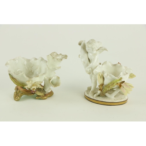 917 - A Moore Brothers white porcelain cherub Sweet Meat Stand, bow encrusted with flowering cacti on oval... 