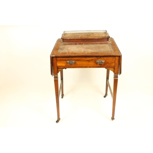 972 - A walnut Ladies drop leaf Writing Table, with two rectangular flaps, the hinged top opening to revea... 