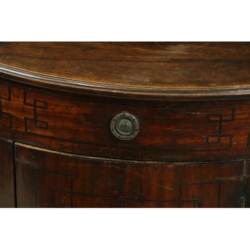 977 - A Regency period ebony strung mahogany bow fronted Corner Washstand, with small shelf and high galle... 