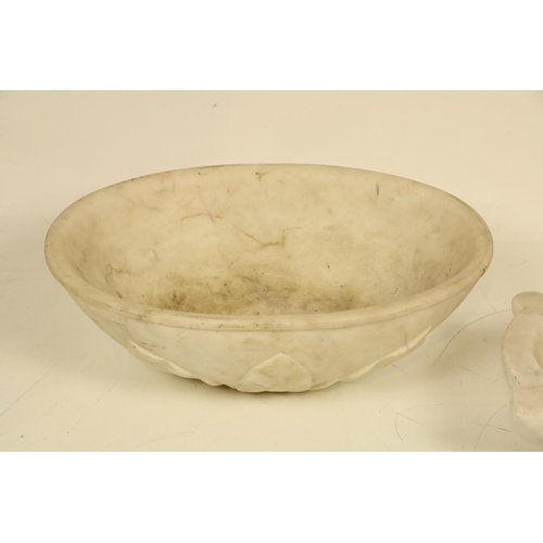 980 - A large oval leaf carved white  marble Font, 19' (48cms); together with an old white Mortar, 11' (28... 