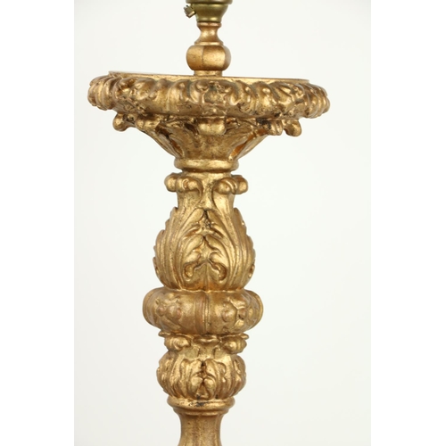 998 - A pair of composition gilt tripod Table Lamps, each moulded with leaves and grotesque masks, 25