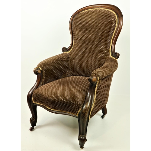 999 - A Victorian shield back mahogany framed Ladies Armchair, covered in brown fabric on front cabriole l... 