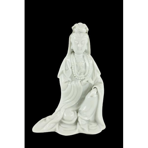 290 - An early blanc-de-chine Chinese porcelain Figure, Quan Yin, she kneeling on one knee holding a scrol... 