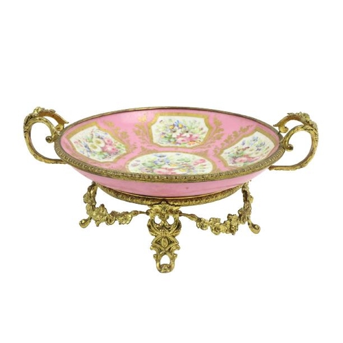 261 - A very attractive  pink ground floral decorated Serves style porcelain Dish, on ornate rococo style ... 