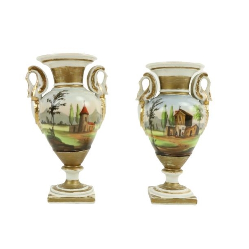 265 - A pair of 19th Century French porcelain two handled Vases, each decorated with figures and houses in... 