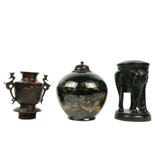 279 - A black ground Chinese Dragon Vase, with wooden cover and six character mark, 10