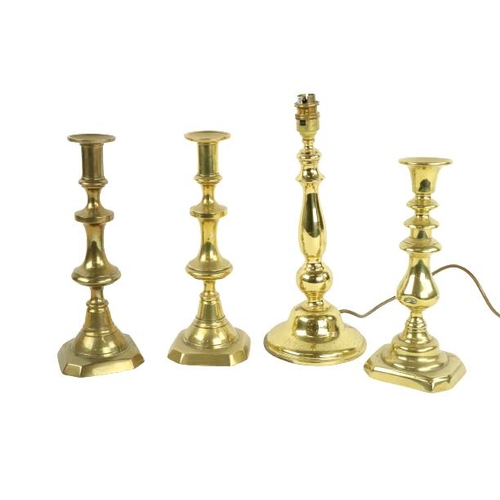 453 - A brass Table Lamp and shade, a pair of 19th Century brass Candlesticks, 12