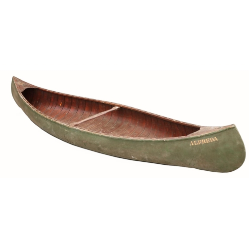 1595 - A late 19th Century American double ended peapod Canoe or Skiff, with latted interior and centre cro... 