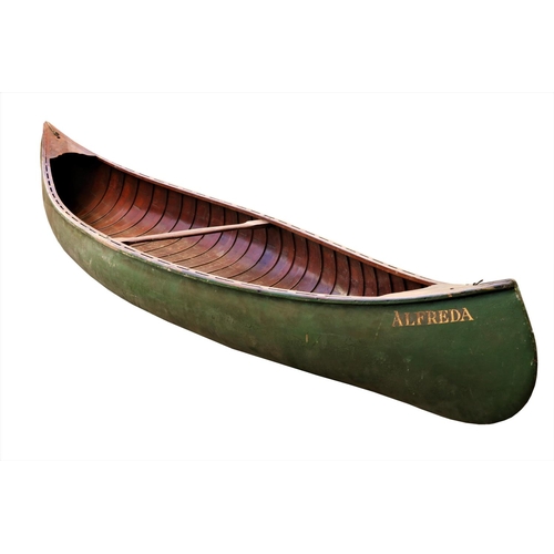 1595 - A late 19th Century American double ended peapod Canoe or Skiff, with latted interior and centre cro... 