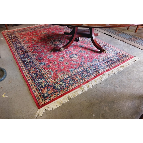 1587 - Two similar Oriental style machine made cotton Rugs, each with all over floral ground with medallion... 