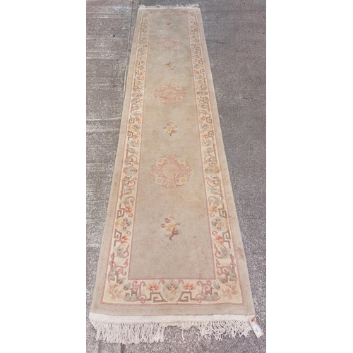 1588 - A green ground heavy woollen floral decorated Carpet Runner, approx. 353cms x 80cms (11'7