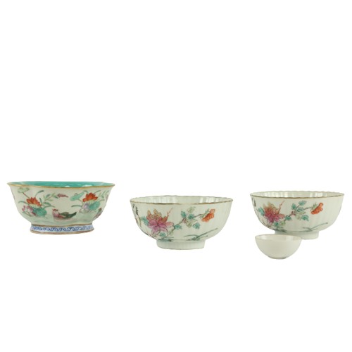 285 - A pair of Chinese porcelain Famille Verte reeded Bowls, with flowers and birds, each with a square r... 