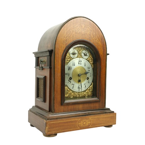 254 - An Edwardian marquetry inlaid chiming dome top Bracket Clock, the brass and silverised dial with Ara... 