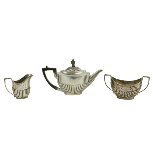 625 - A small Sheffield silver Bachelors Tea Service, teapot, sugar bowl and cream jug, each with half ree... 