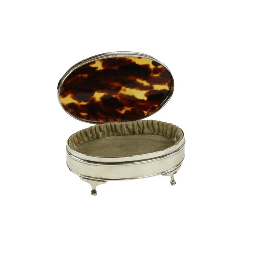 718 - An oval Birmingham silver and tortoiseshell Dressing Table Jewellery Casket, on scroll legs, 5 1/4