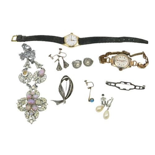 763 - A collection of Costume Jewellery, including ear-rings, brooch, watches etc., as a lot, w.a.f. (1)... 