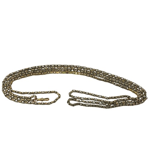 768 - A gold link Chain, of long proportions with fob link, approx. 30