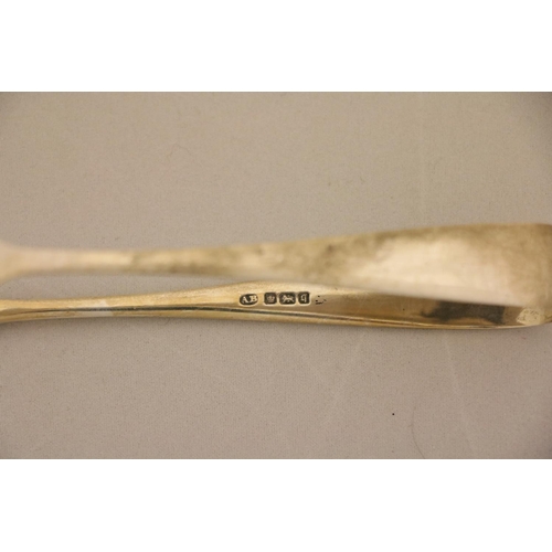 100 - A George III silver double bowl Marrow Scoop, Dublin 1812; together with two silver Sugar Tongs; a s... 