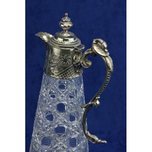 113 - A cutglass Claret Jug, c. 1900, with silver mounted top and handle, 31cms (12