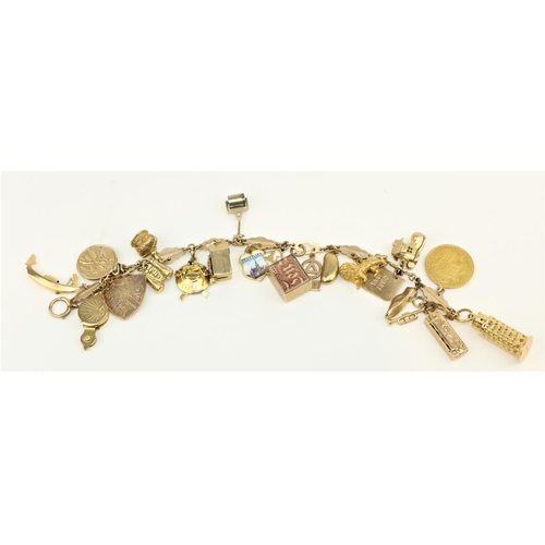 224 - An attractive gold Charm Bracelet, with 21 charms, including a shield back half sovereign (1832), li... 