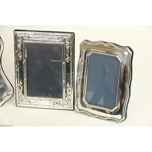 23 - A large cartouche shaped silver mounted Table Photograph Frame, 36cms x 31cms (14
