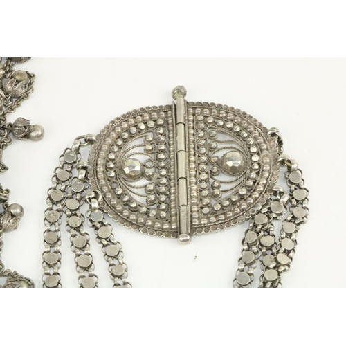 249 - An unusual three string Oriental silver Belt with buckle, and an Oriental Necklace or Choker. (2)... 