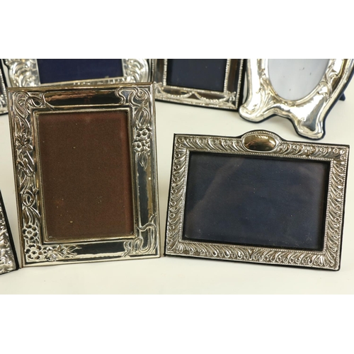 25 - A pair of silver mounted Photograph Frames, in the Adams style, 20cms x 14cms (8