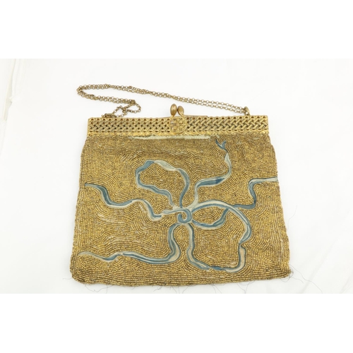 256 - A fine early Victorian embroidered and gilt bead Ladies Evening Bag. (1)