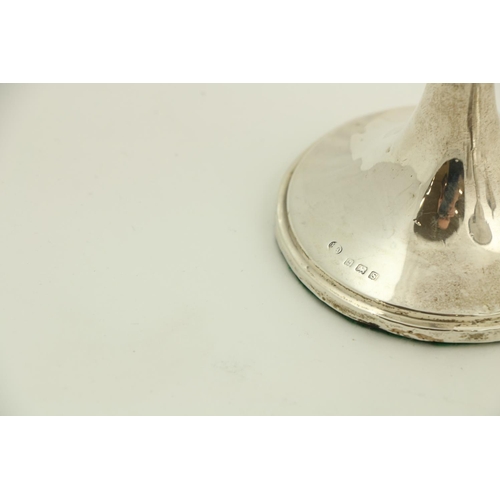 37 - A tall silver helmet shaped Cream Jug, Birmingham 1900, with weighted stem base, 15cms (6