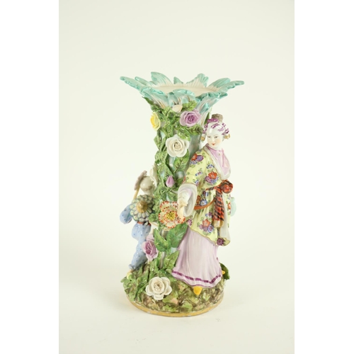 374 - A Sitzendorf porcelain Table Centre, with Asian mother and child around a flower encrusted tree, lac... 