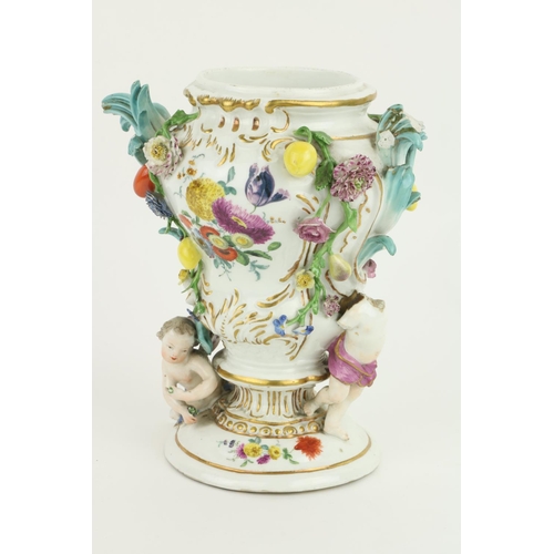 380 - A 19th Century porcelain Meissen Vase, the floral encrusted design with cherubs and fruit, approx. 2... 