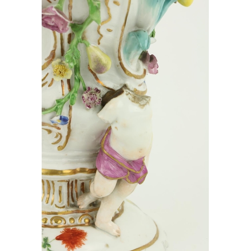 380 - A 19th Century porcelain Meissen Vase, the floral encrusted design with cherubs and fruit, approx. 2... 