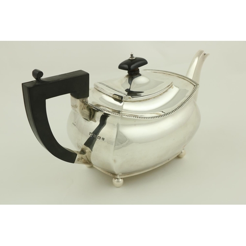 39 - A rectangular ogee shaped silver Teapot, by Atkin Bros., Sheffield c. 1900, with ebonised handle, 23... 