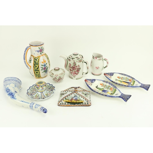 402 - A pair of Quimper ware fish shaped Dishes, each painted with a figure, a Quimper ware envelope shape... 