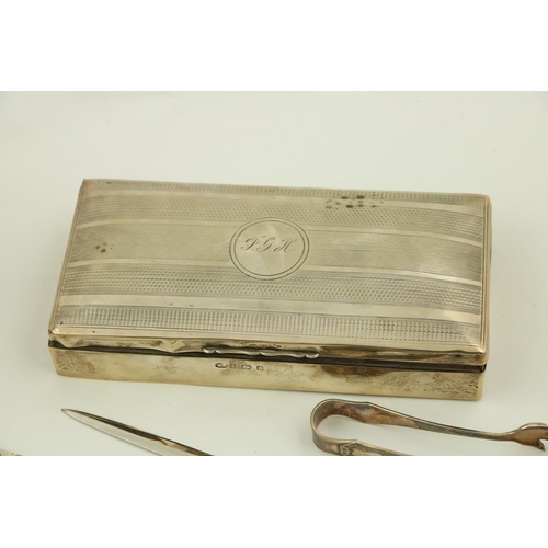 48 - A rectangular machine turned silver Cigarette Box, 18cms (7