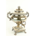 A good William IV period heavy silver plated and crested Tea Urn, with two ornate leaf cast handles,... 