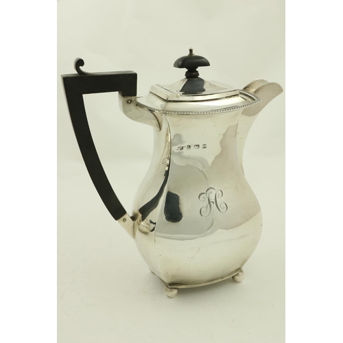 55 - A four piece silver Tea and Coffee Service, Chester 1926, comprising coffee pot, teapot, sugar bowl ... 