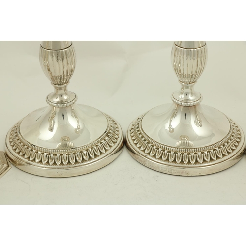 6 - A pair of silver plated cone shaped Vases, each 21cms (8 1/4