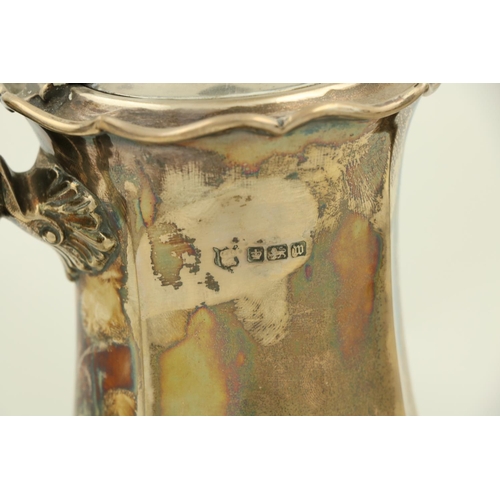 68 - A heavy silver crested Coffee Pot, Sheffield 1914, of baluster form with double leaf scroll handle, ... 