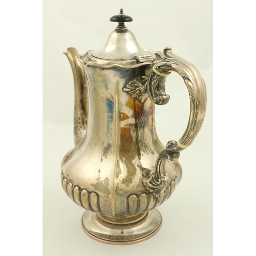 68 - A heavy silver crested Coffee Pot, Sheffield 1914, of baluster form with double leaf scroll handle, ... 