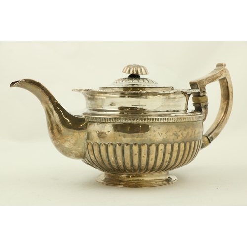 70 - A three piece late George III Irish silver Tea Service, by James Le Bass of Dublin 1819, the teapot ... 