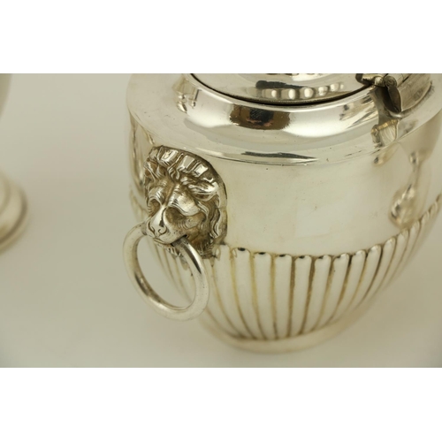 74 - A silver vase shaped Sugar Castor, Birmingham 1933, together with another similar, Birmingham 1926; ... 