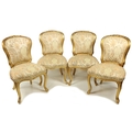 A set of 4, 19th Century fine quality Louis XIV style Side Chairs, the shield shaped upholstered bac... 